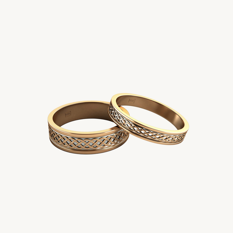 Gold-coloured bangles with an interwoven motif, shown overlapping